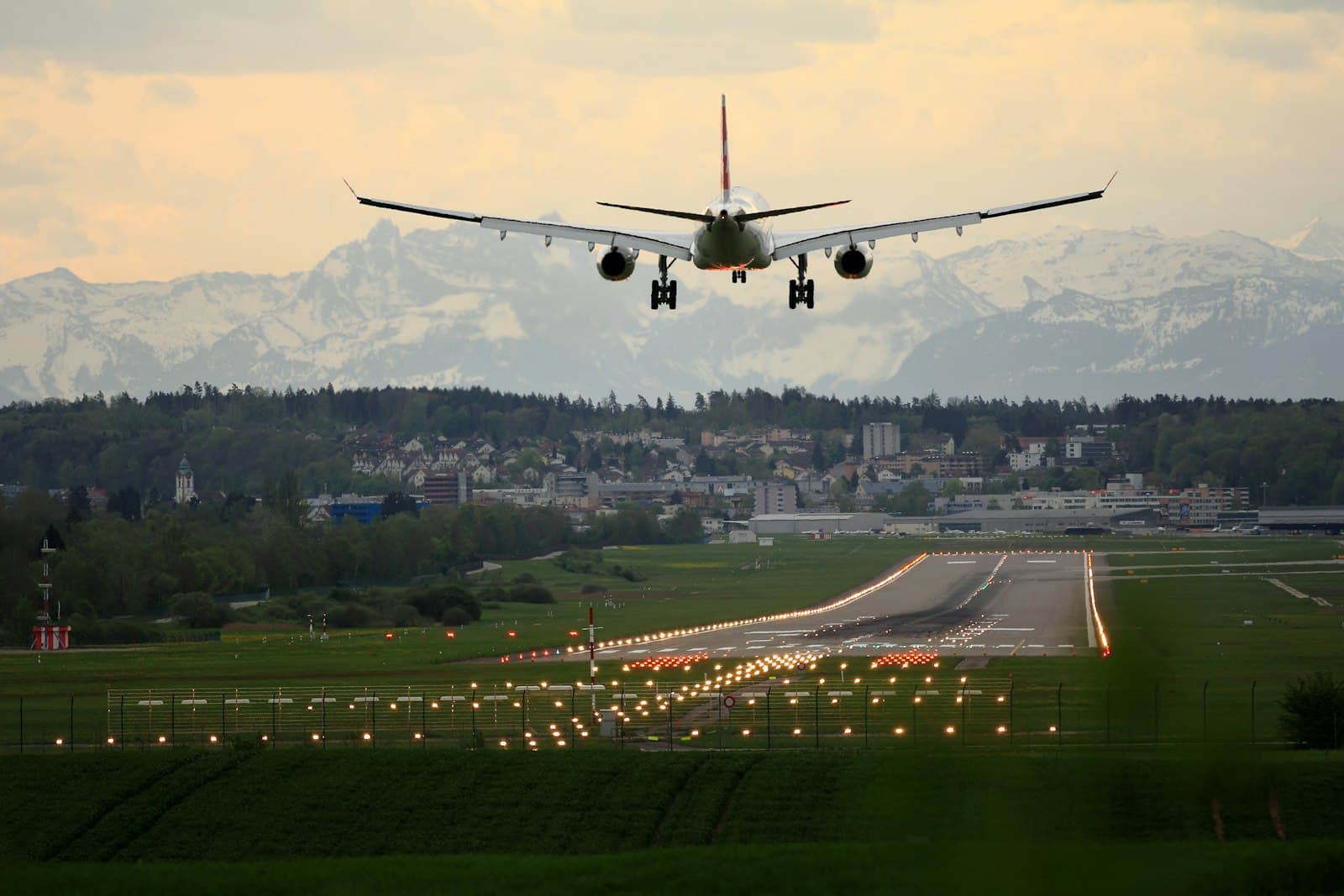 Traveler walking through a bright modern airport terminal